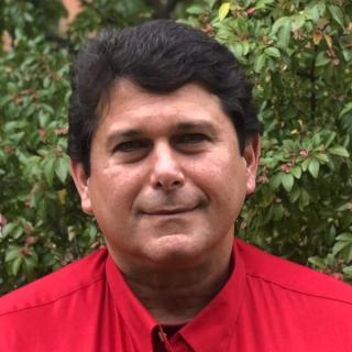Christopher Hadad in a red shirt
