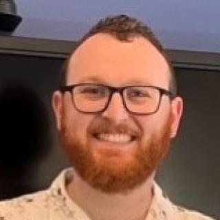 Brian Fries in a conference room